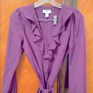 Precious plum tie-waist ruffle top.